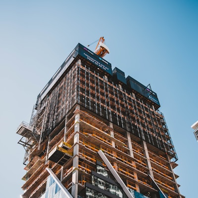 brown and gray building under construction