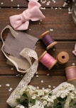Flat lay of natural textile materials and sewing tools