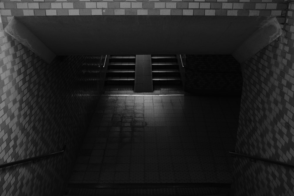 a black and white photo of a stairwell