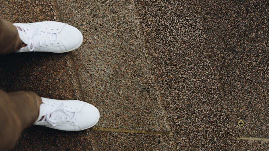 pair of white low-top shoes
