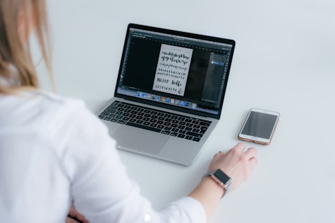 woman using MacBook