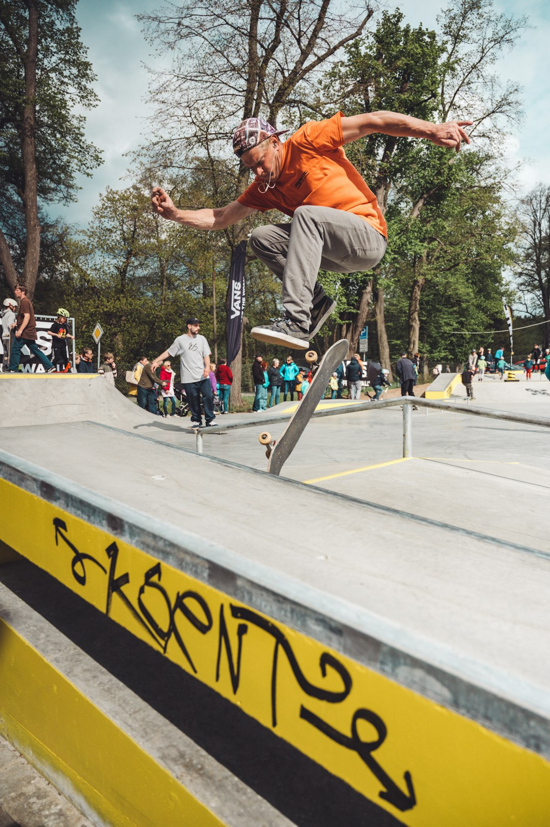 man doing skateboard tricks at the park