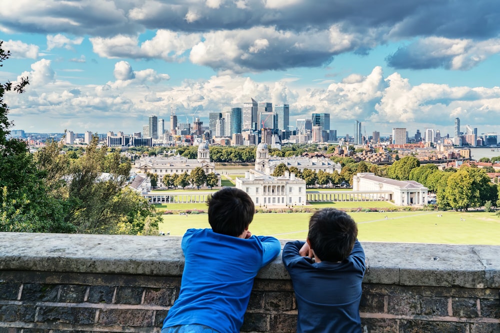 two boys on wall