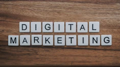digital marketing artwork on brown wooden surface