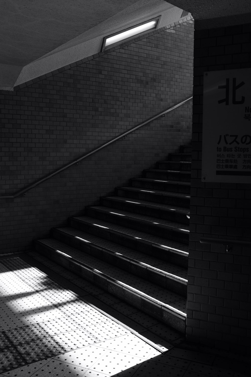 grayscale photography of stairs