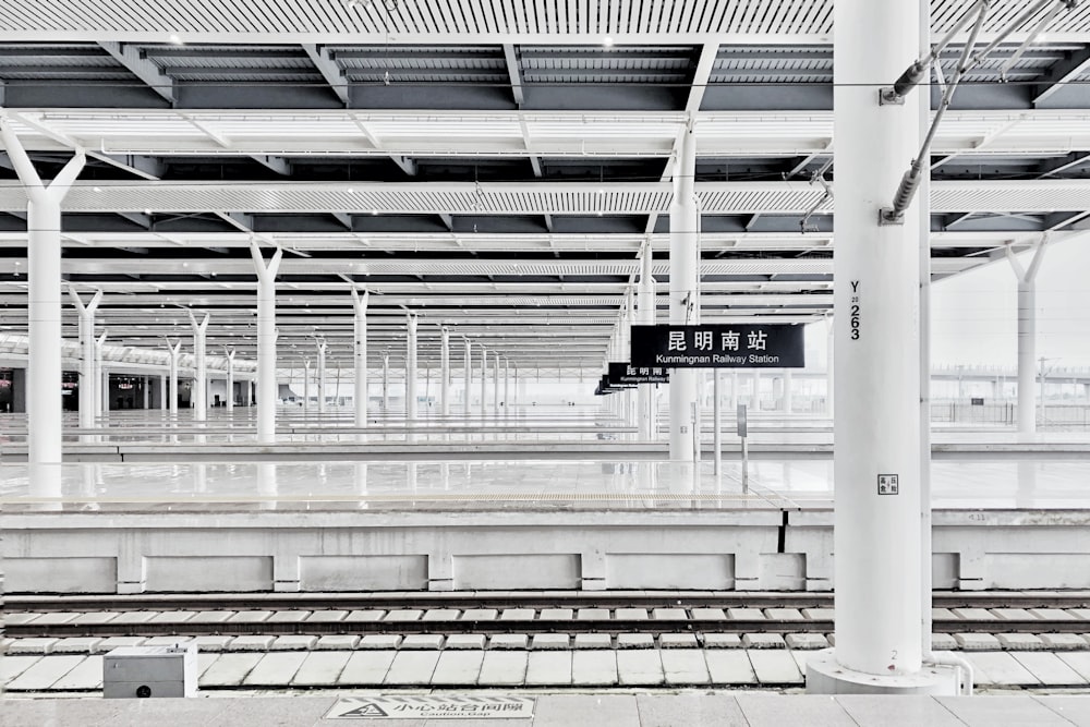 white wall vacant train station during daytime