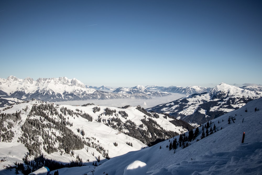 snow covered mountain during daytime