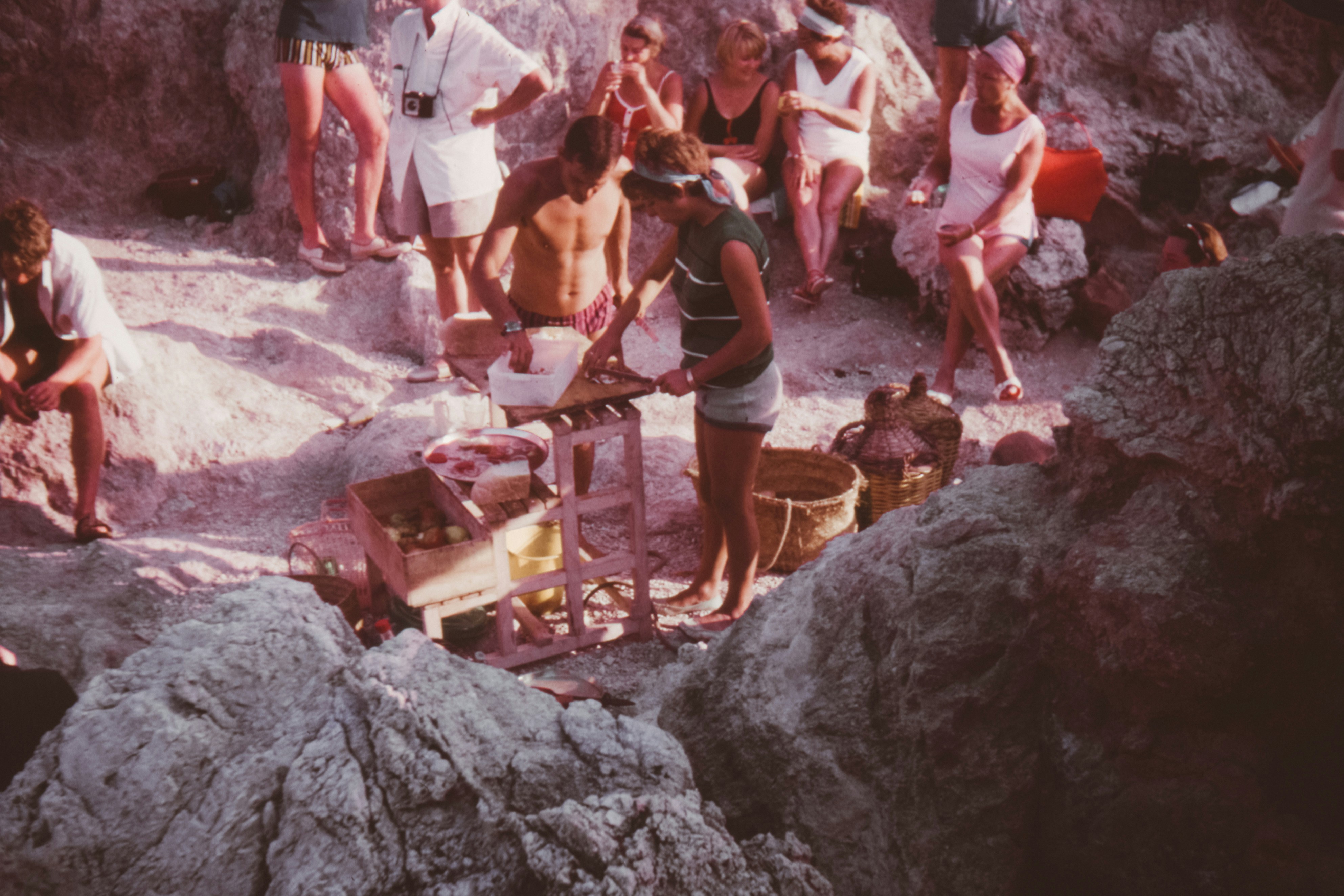 people near rocks
