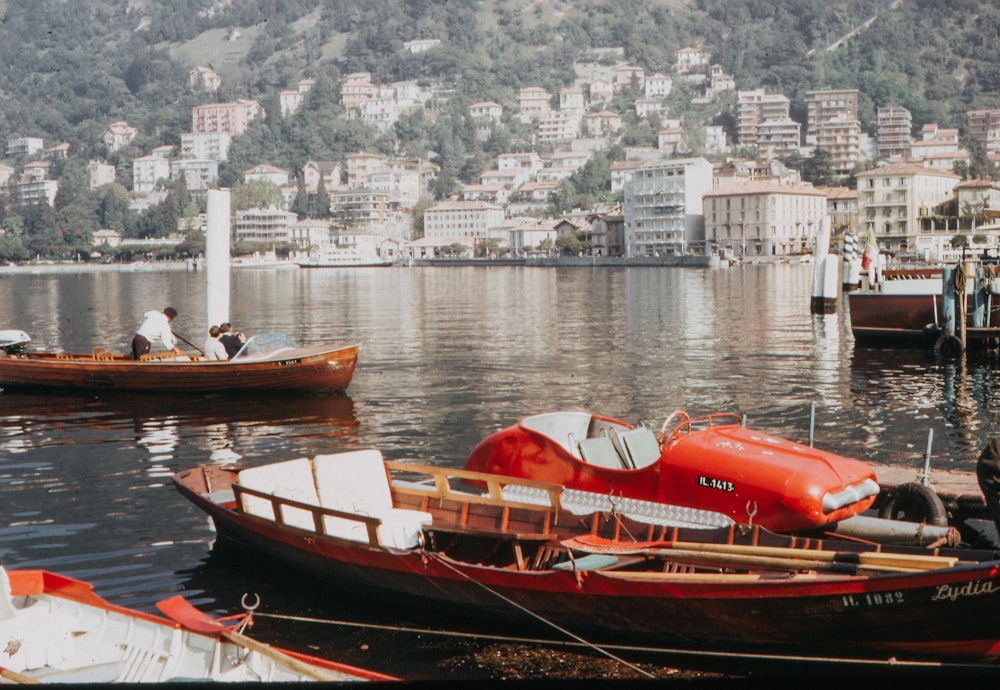 boats on body of water near the city