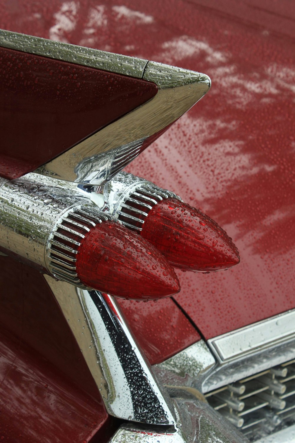 red and gray vehicle close-up photography