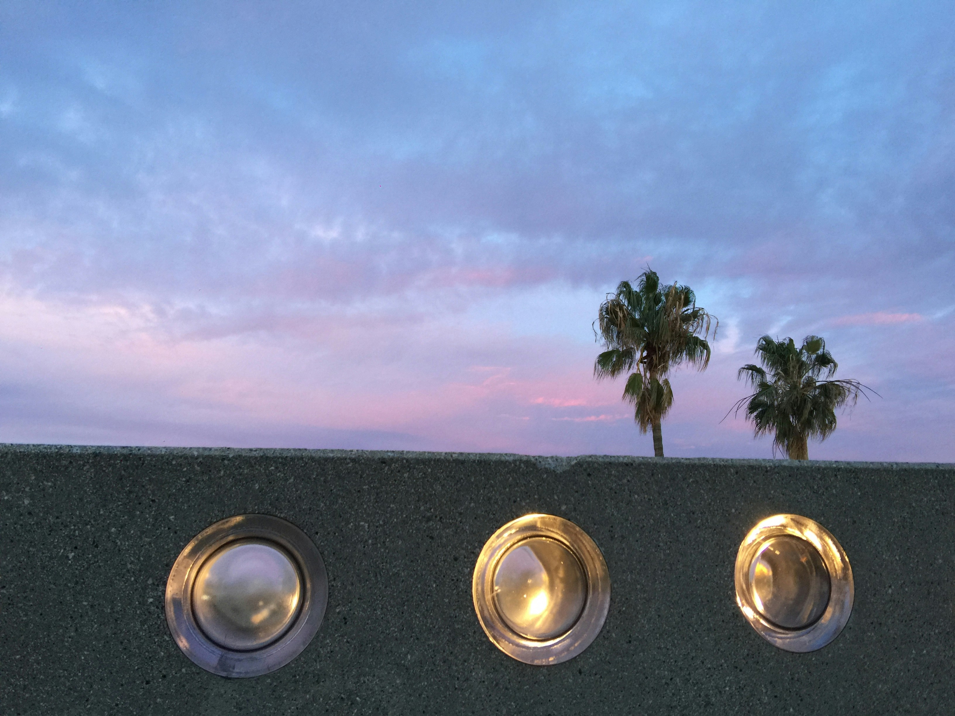 three round glass holes during daytime