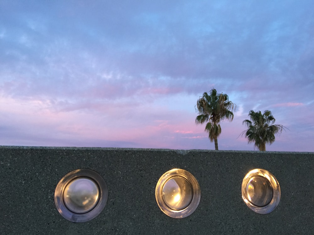 three round glass holes during daytime