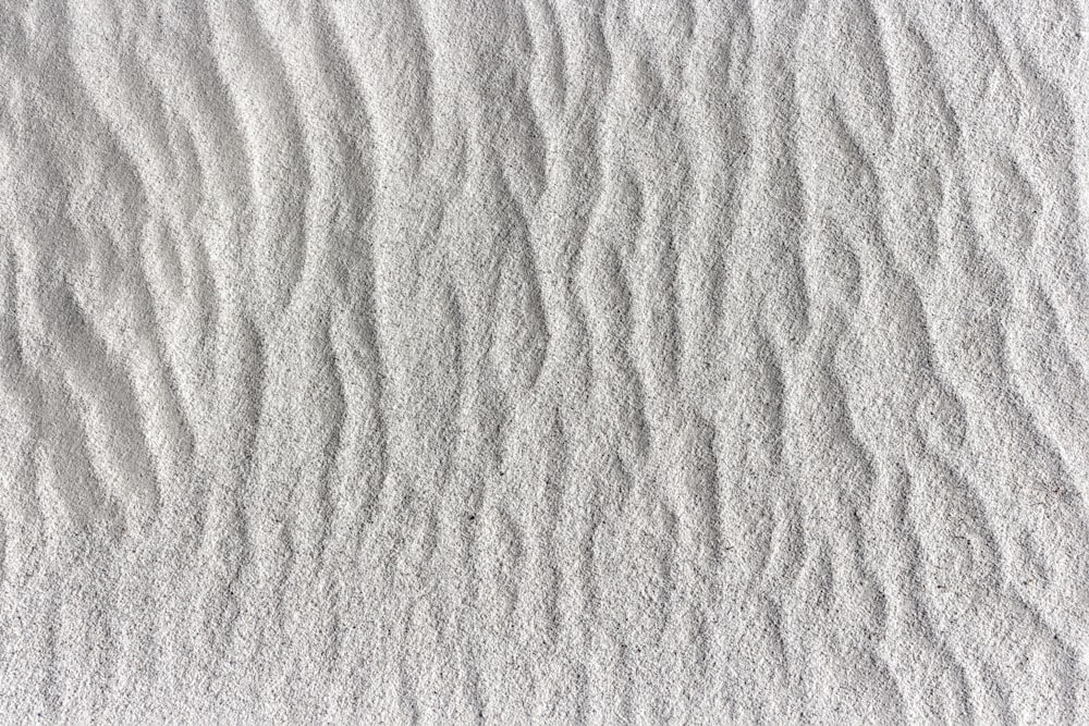 a close up of a white sand texture