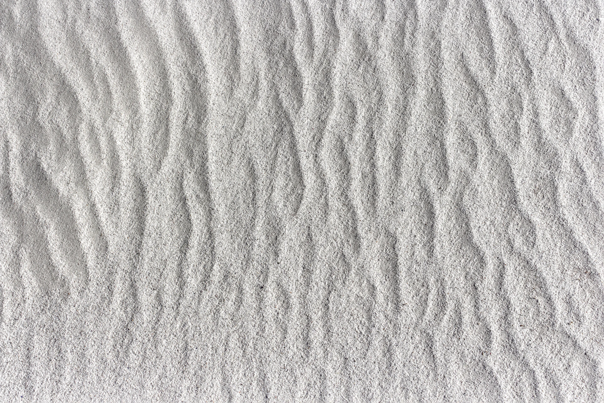 a close up of a white sand texture