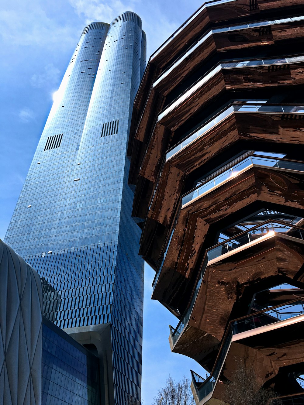 low-angle photography curtain wall high-rise building during daytime