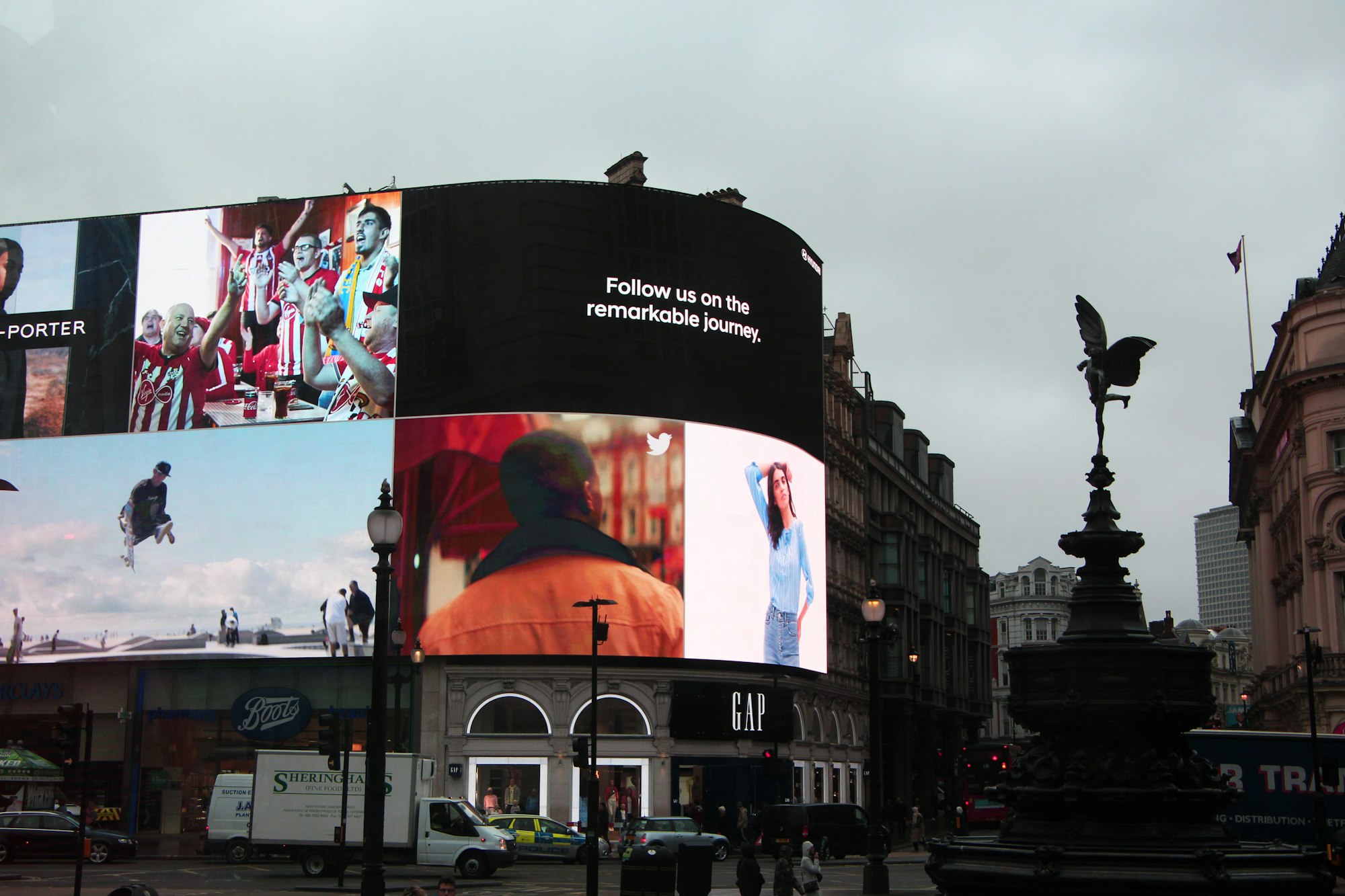 video advertisements on LED billboard in city