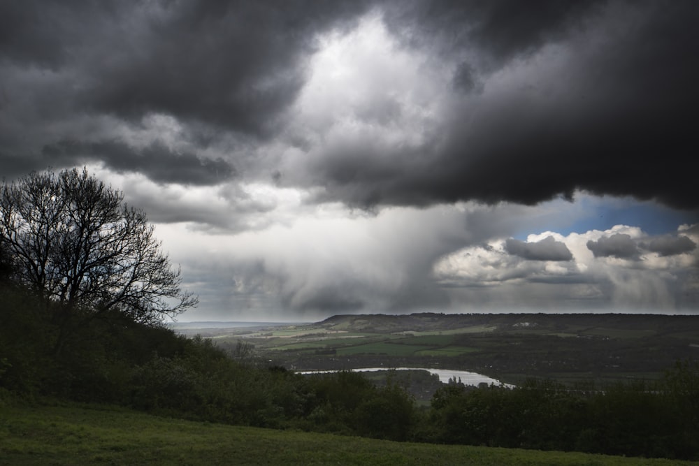 white clouds above plains