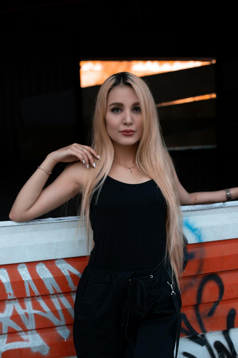 woman leaning on wall