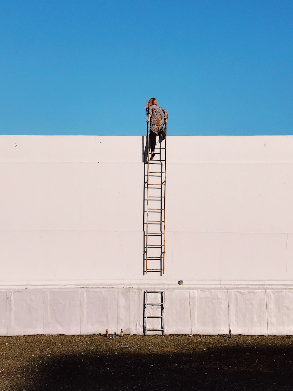 woman climbing on ladder