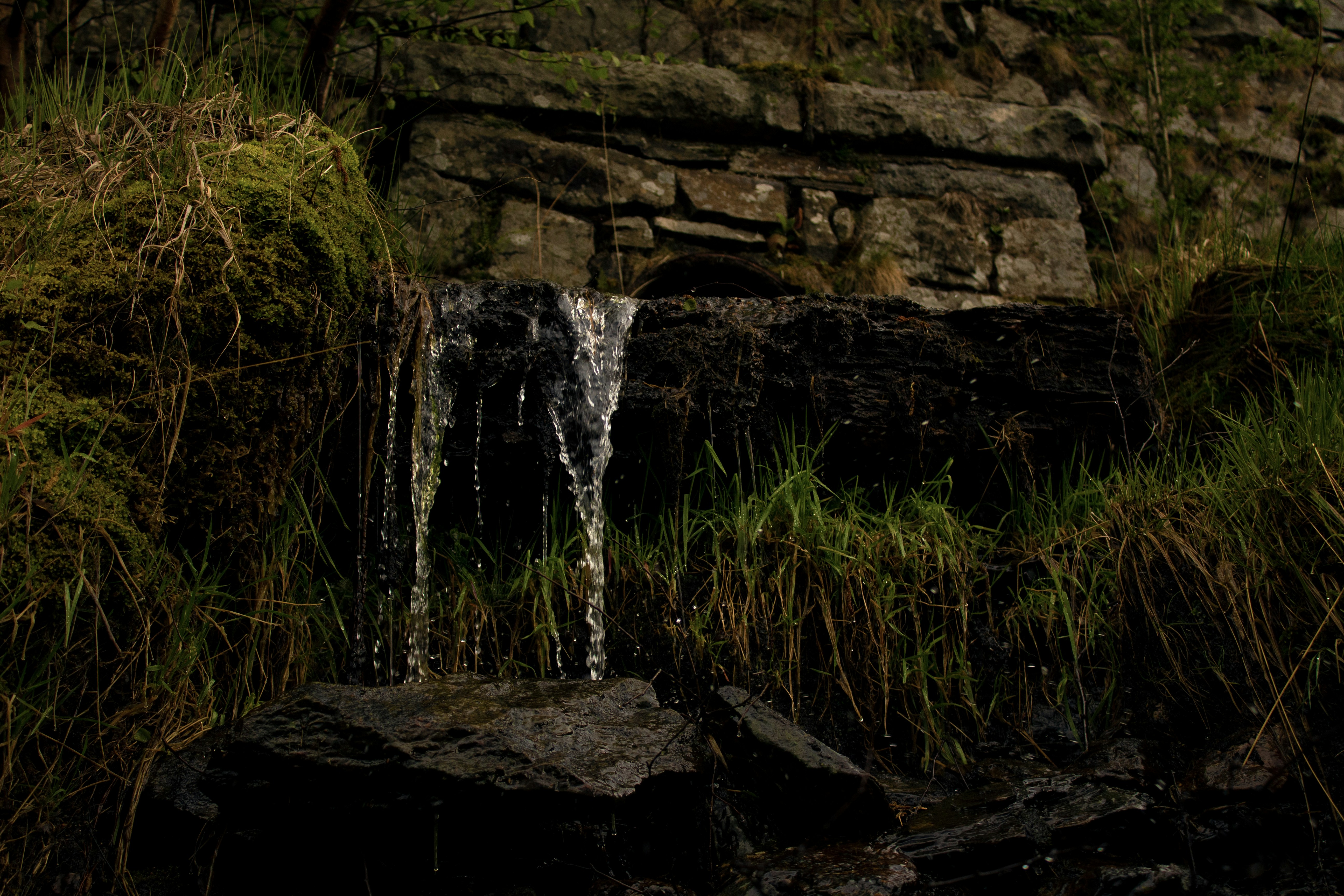 low-angle photography of rocky wall