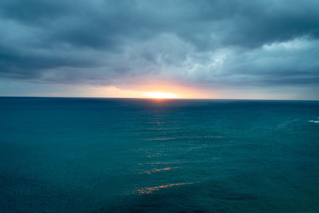 blue sea at sunrise,