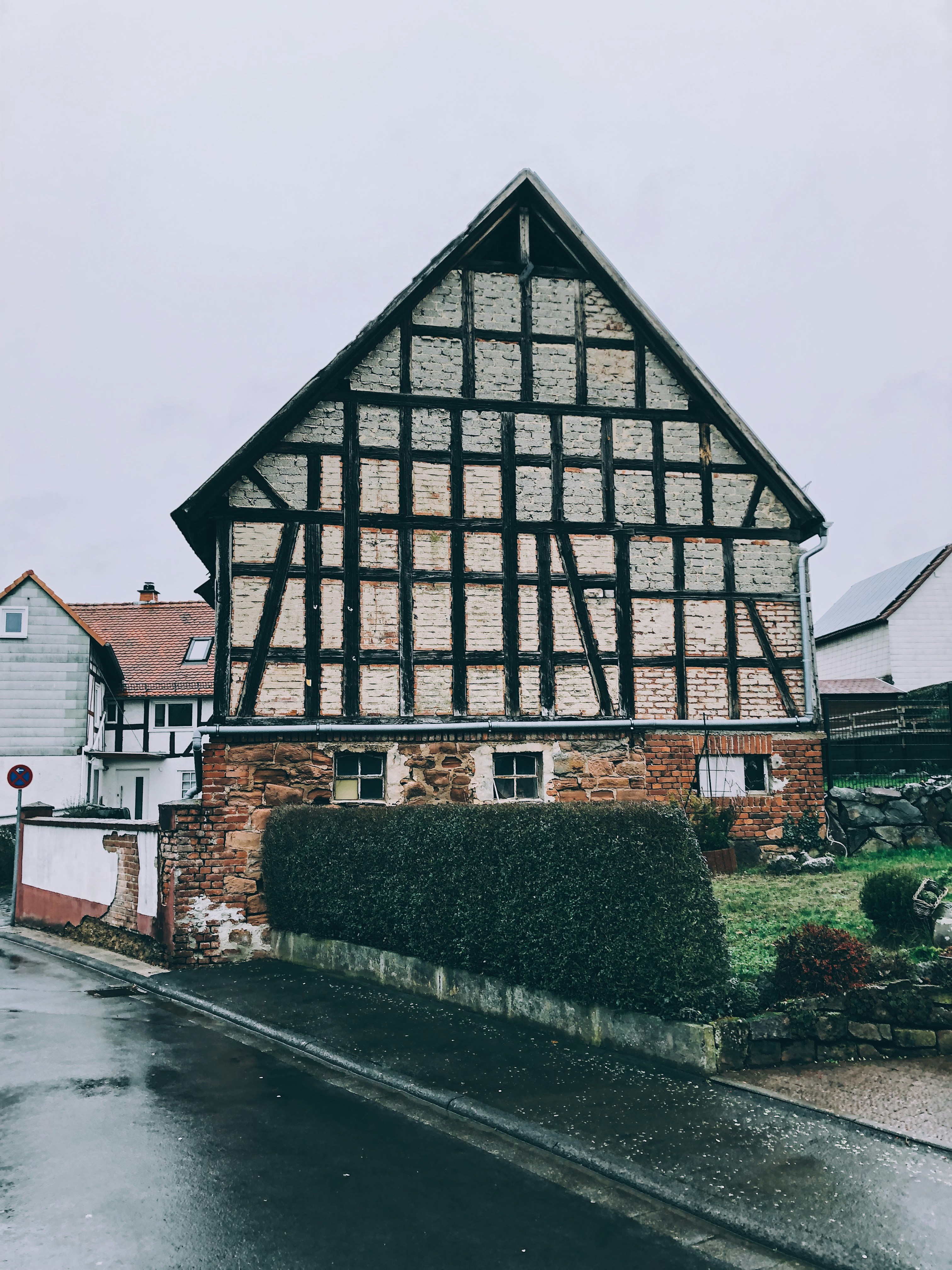 gray and brown house near road
