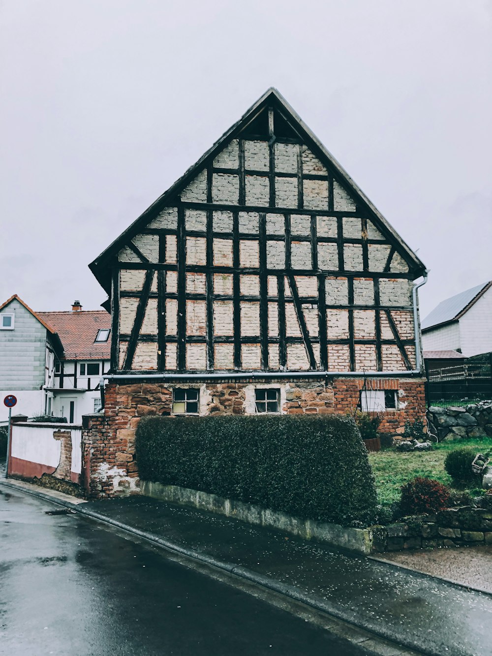 gray and brown house near road