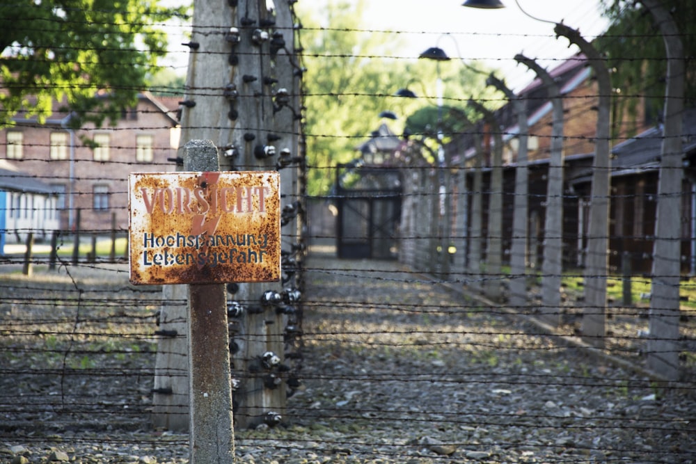 shallow focus photo of brown signage