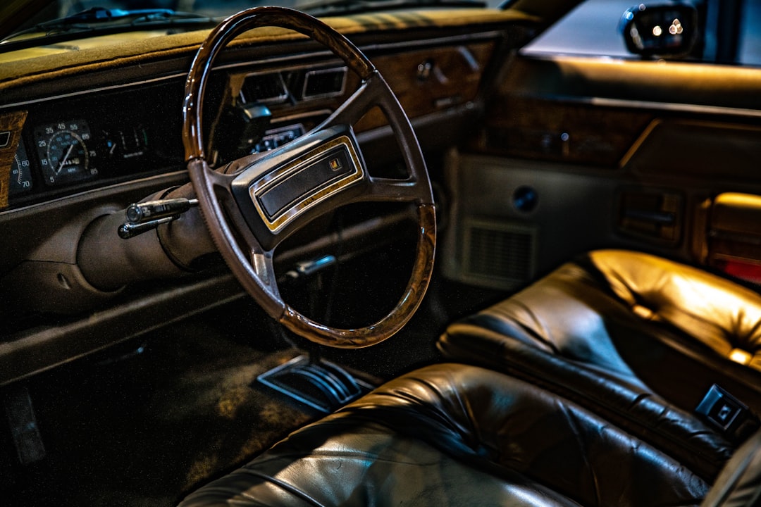 vehicle steering wheel in closeup photo