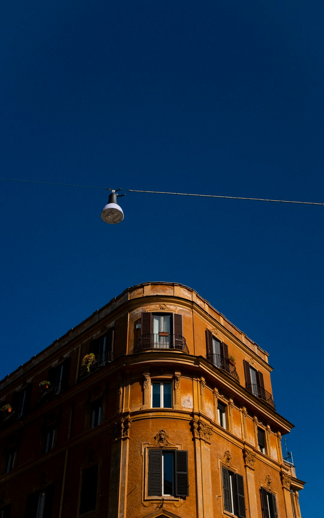 low-angle photography of brown concrete building