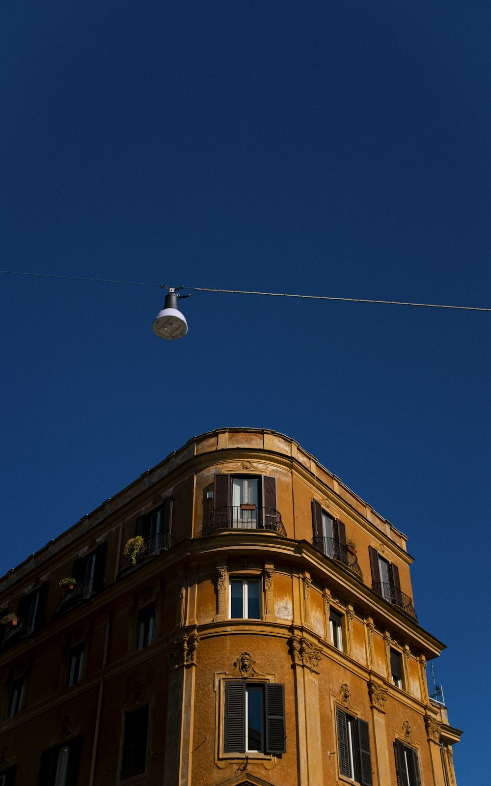 low-angle photography of brown concrete building