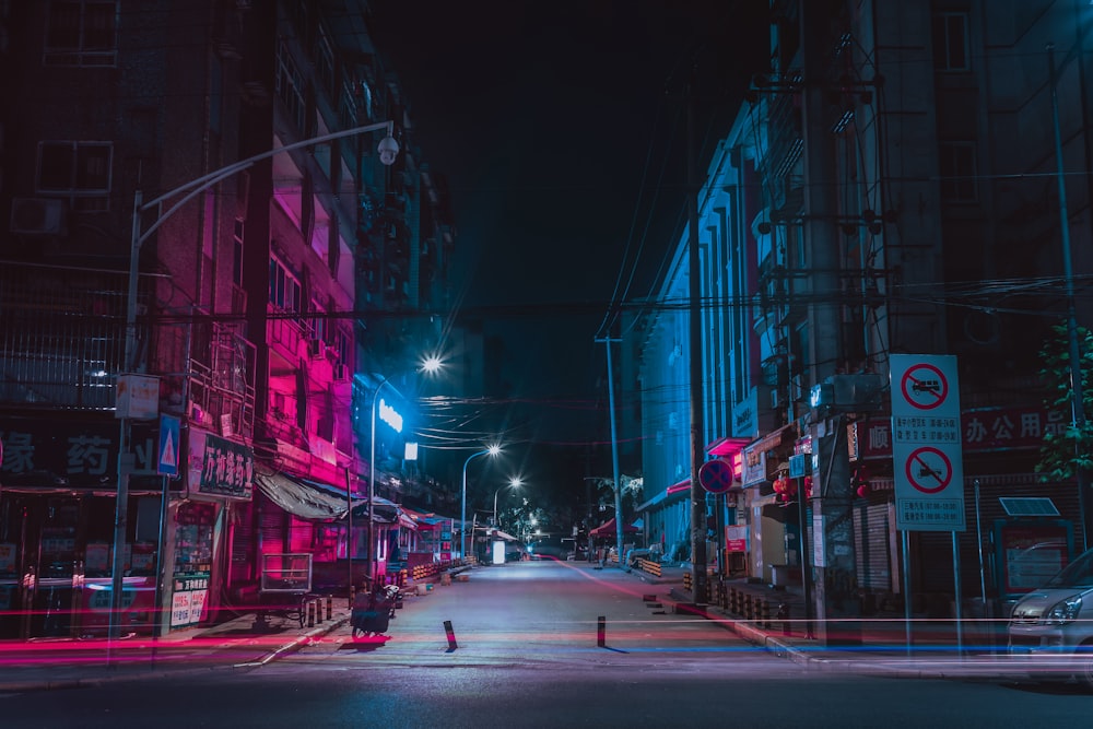 blue and pink lights at night