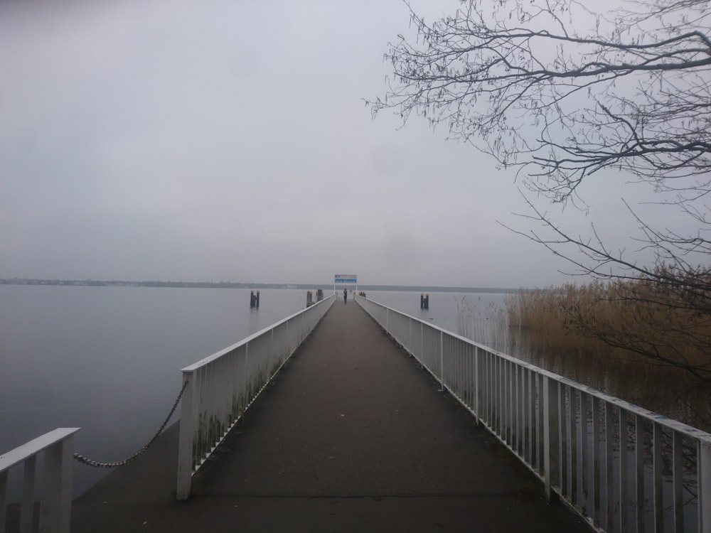 pier on dark clouds