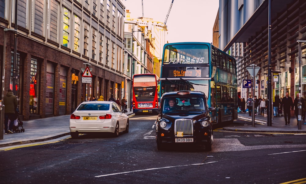 cars and buses on the streets of the cityt