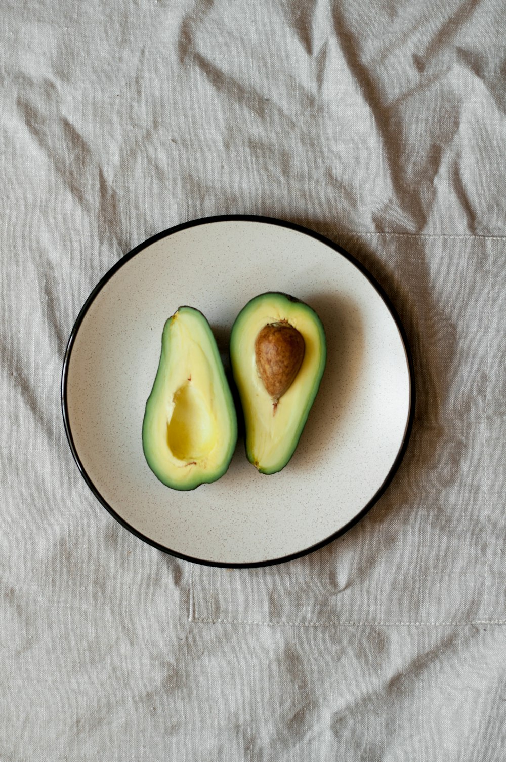 sliced avocado on plate