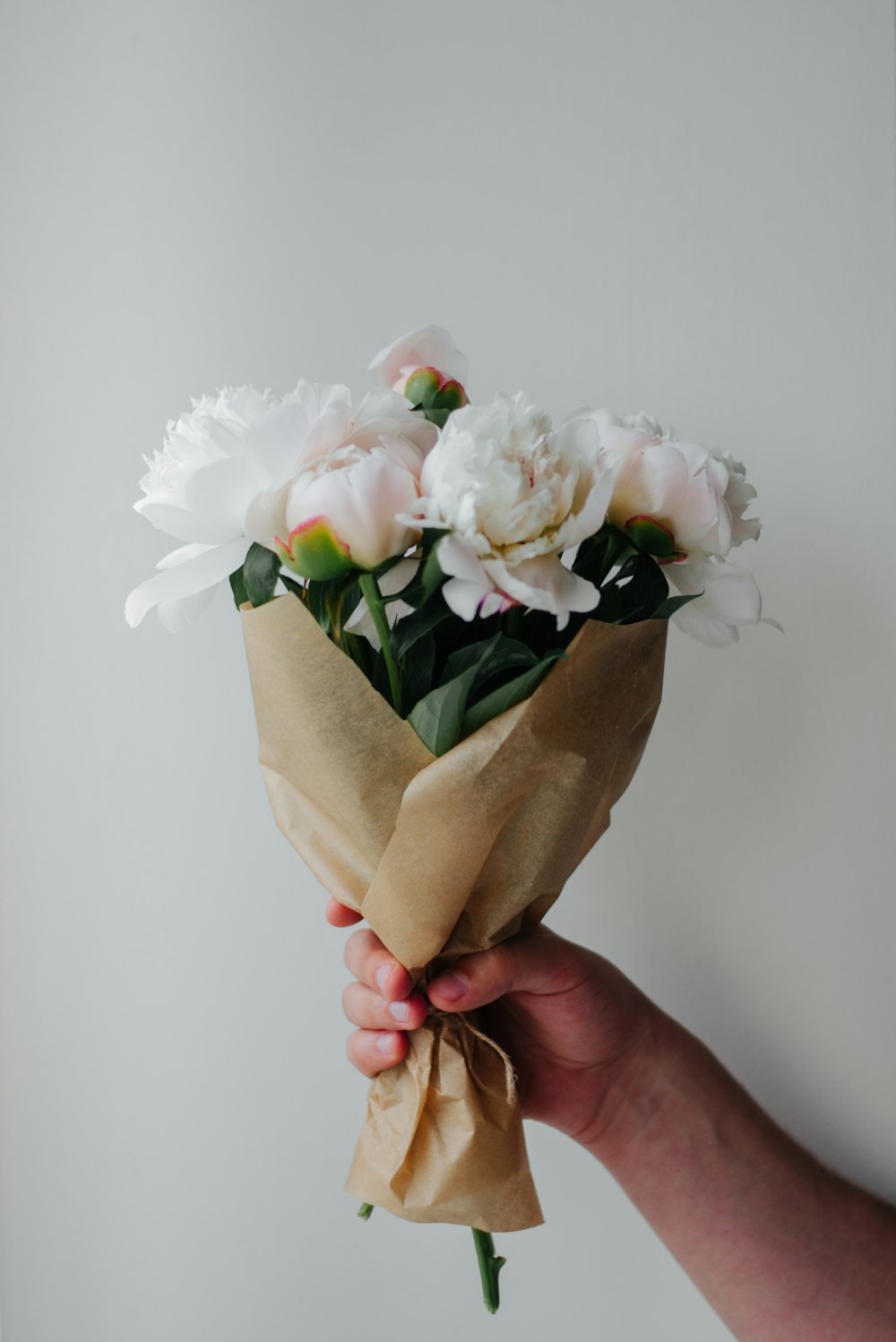 white and beige rose flower bouquet