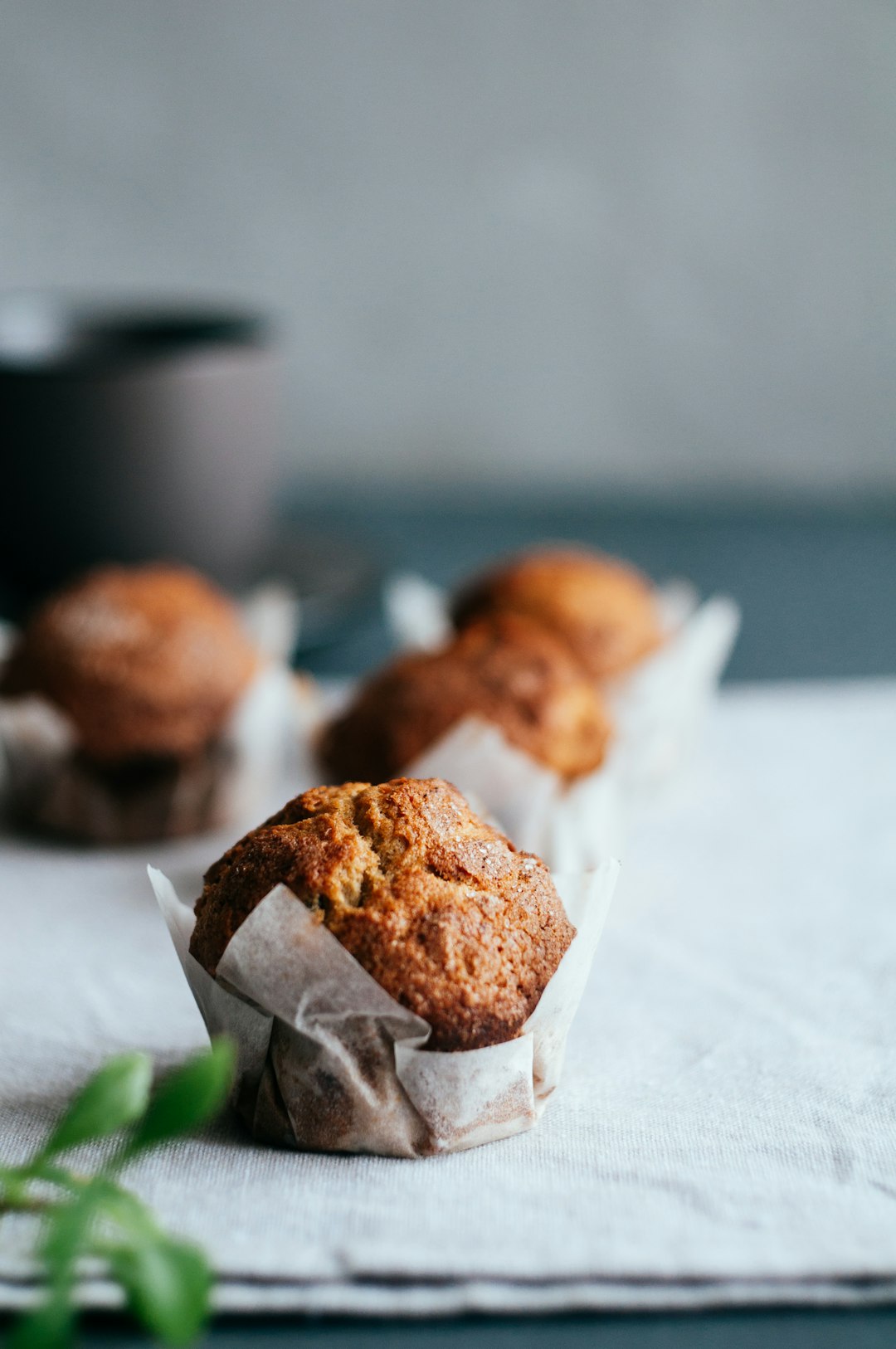 baked muffin on beige surface