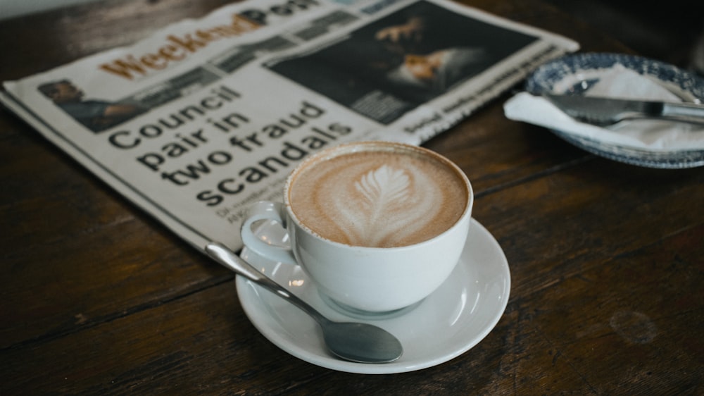 white mug on saucer