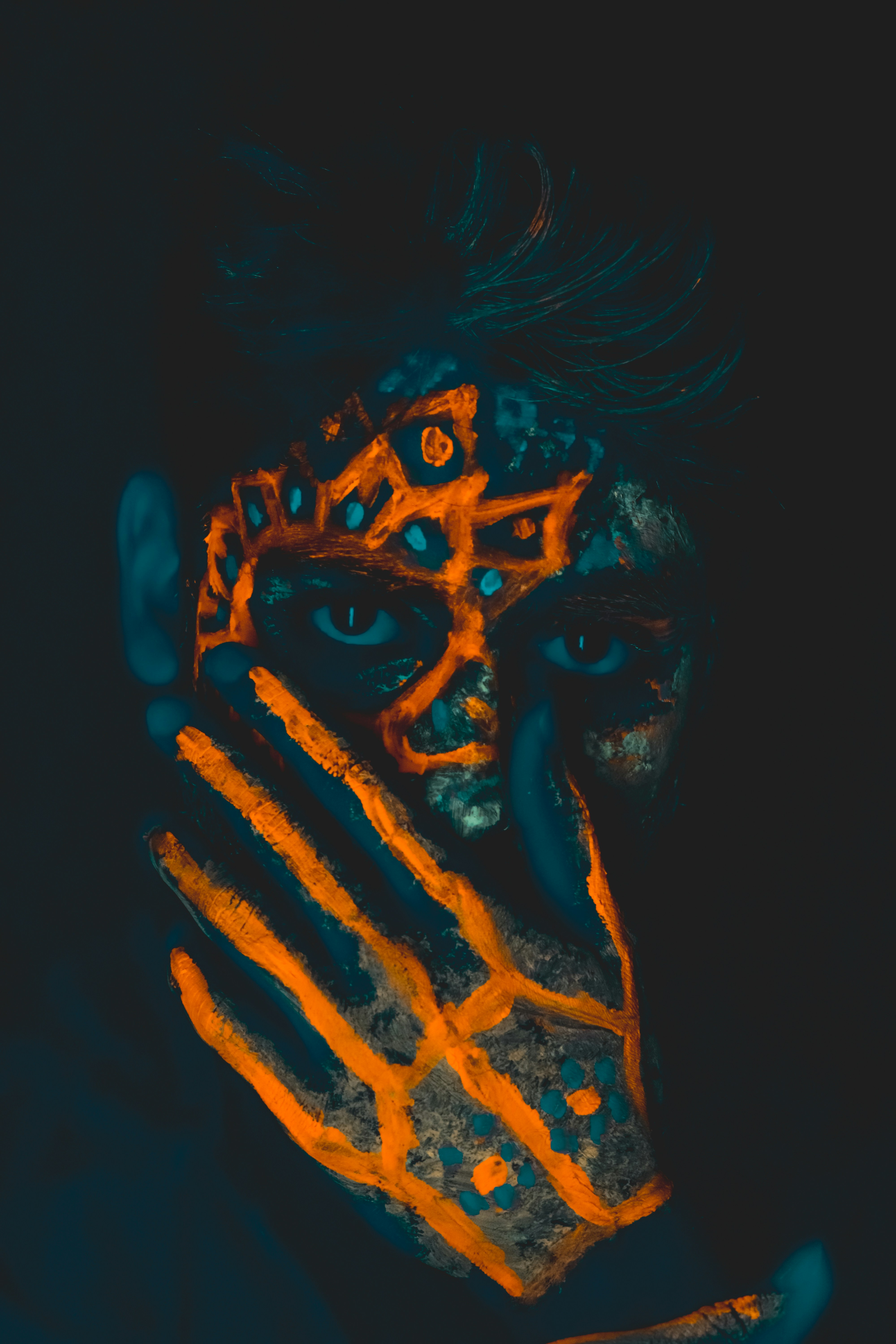 person with face tattoo