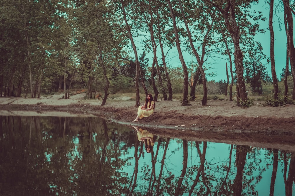 woman near body of water