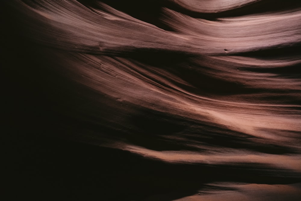 a large wave of water in the middle of a desert