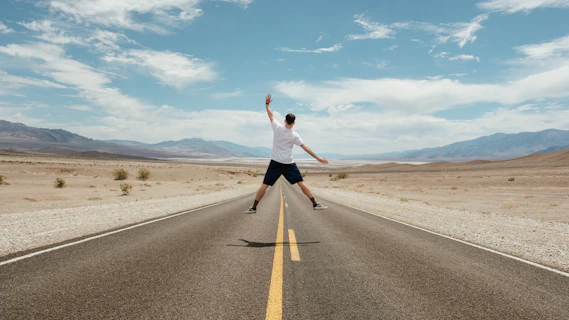 man jumping during daytime