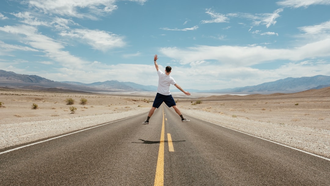 man jumping during daytime