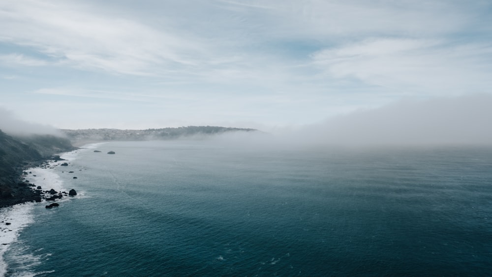 calm body of water during daytime