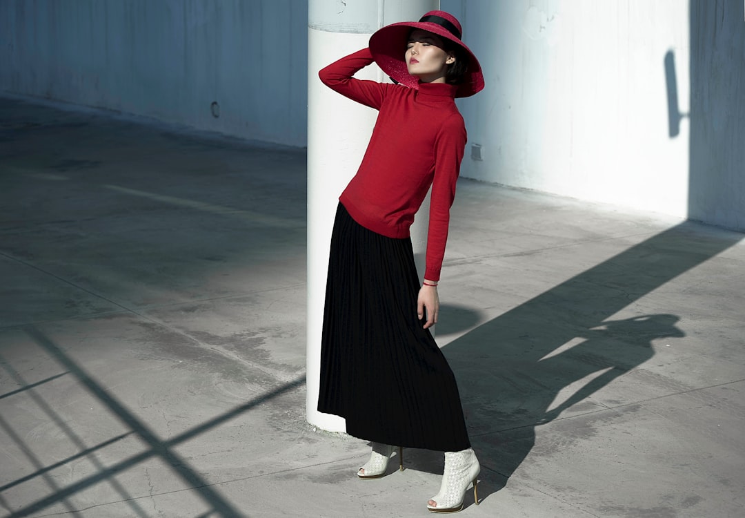 woman wearing hat and black skirt