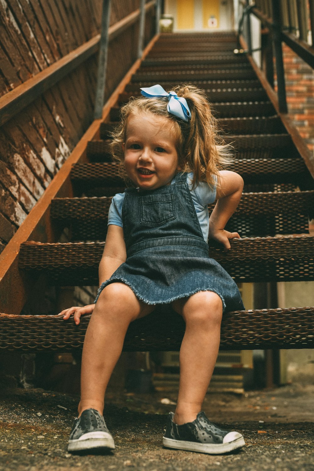 girl sitting on stairs
