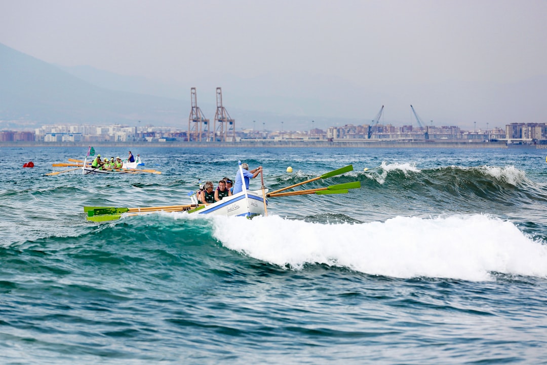 people riding on boat at daytime