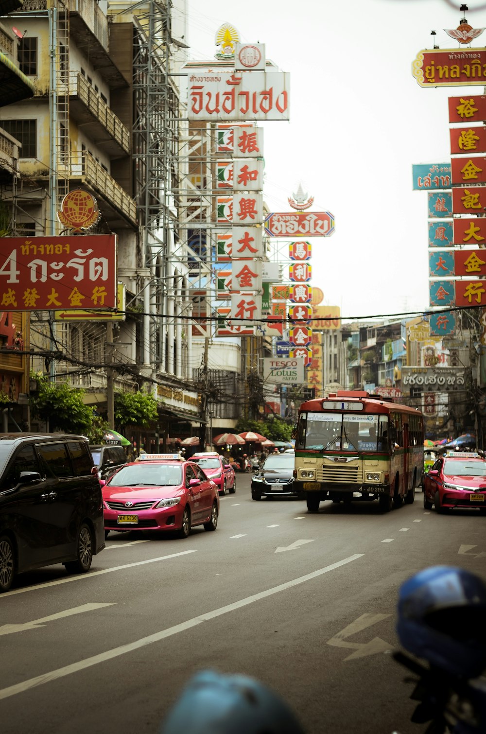 assorted-color vehicles on road during daytime