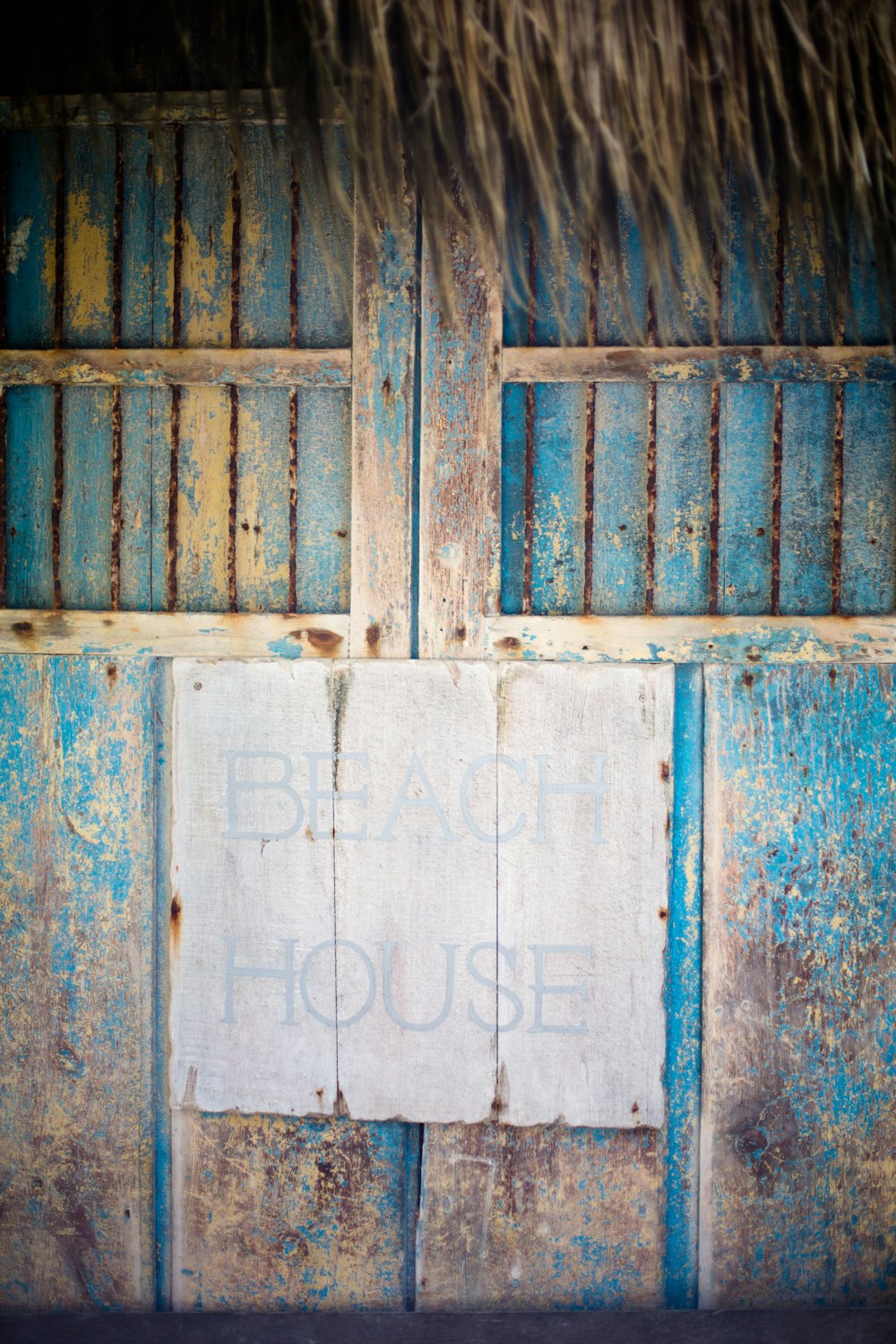 blue wooden beach house