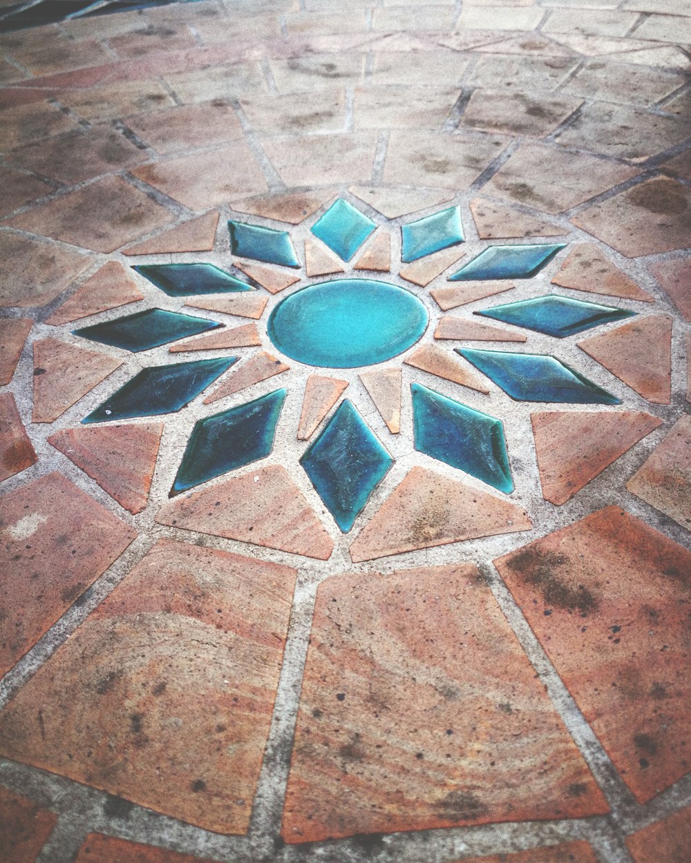 blue and brown flower tile